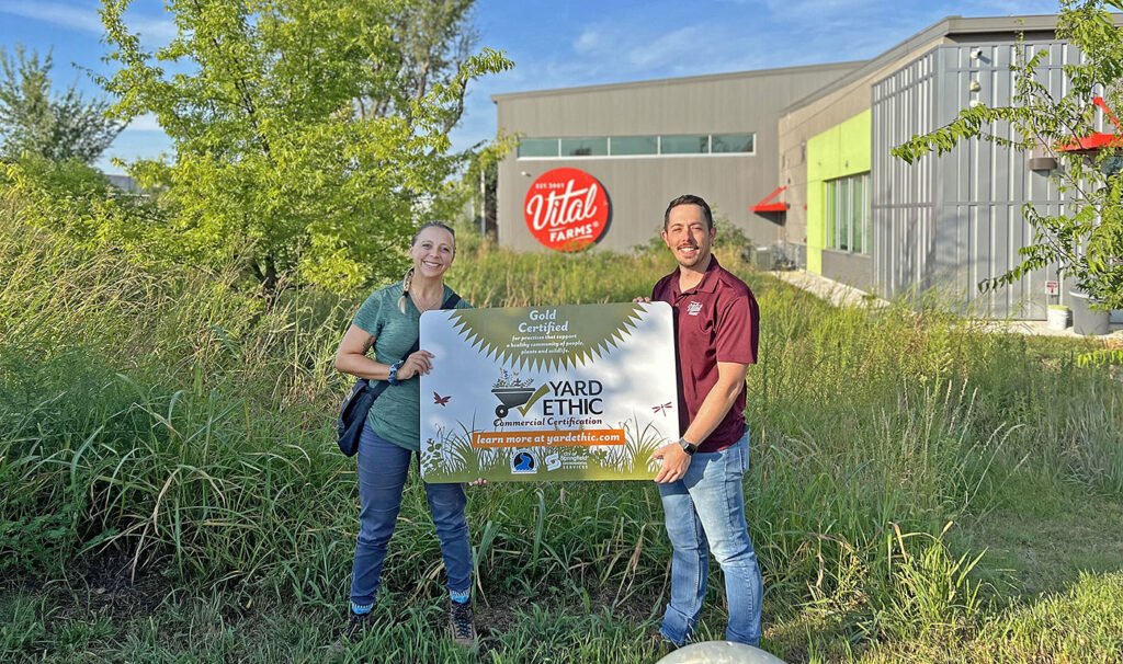 presentation of yard certification sign to vital farms representative